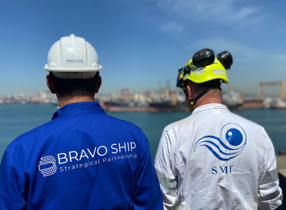Two maritime professionals from Bravo Ship and SMT Shipping discussing shipyard operations.