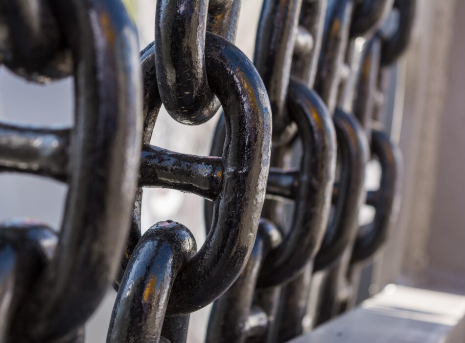Close-up view of black-painted marine anchor chain link supplied for shipyard mooring operations in Turkey