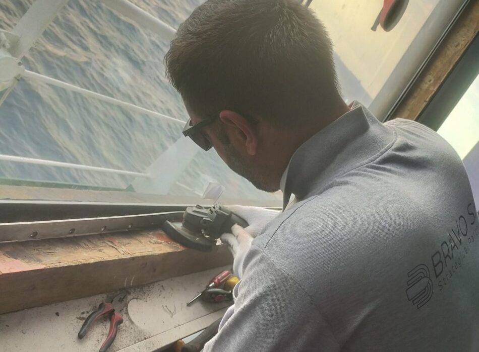 Bravo Ship technicians installing customized heated bridge windows onboard a vessel in Lomé, Togo, after manufacturing in Turkey.